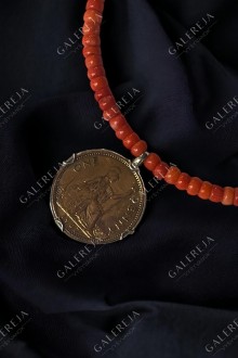 Necklace with a coin